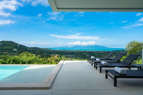 "Soak up the sun or dive into a good book on our inviting sun loungers."