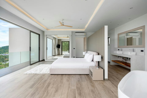 "Dream in bliss in another of our elegantly furnished bedrooms."