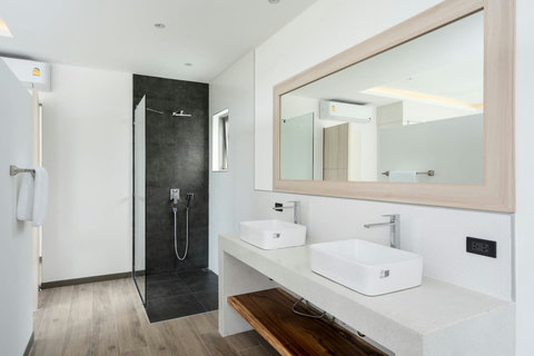 "Artistically designed bathroom adding a touch of sophistication to your routines."