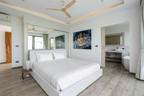 "Dream in bliss in another of our elegantly furnished bedrooms."