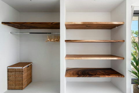 Built-in wooden wardrobe with ample storage space