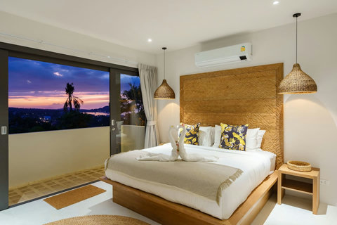 Outdoor terrace lounge at twilight with panoramic views