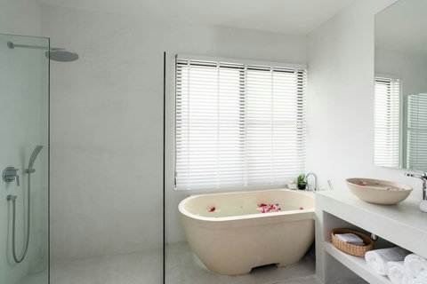 Luxury bathroom with freestanding bathtub and natural light