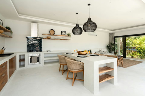 Open-plan living space with contemporary tropical design