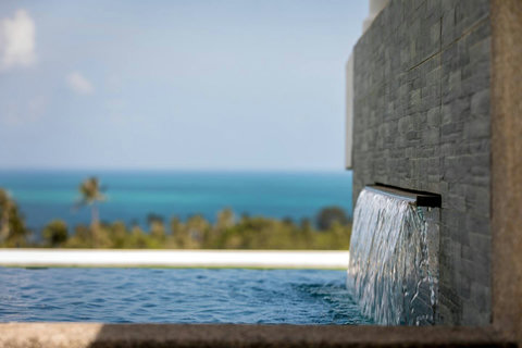 One of two infinity pools with stunning waterfall feature and uninterrupted sea views - includes jacuzzi