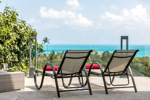 Outdoor lounge area with stunning sea views - perfect for sunset watching and tropical relaxation