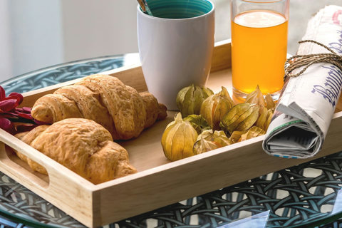 Morning breakfast tray with fresh pastries and tropical fruits - daily maid service and optional private chef available