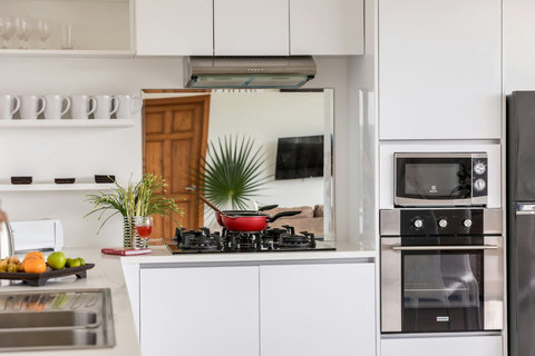 Contemporary kitchen with premium appliances, gas range and oven - everything needed for self-catering luxury