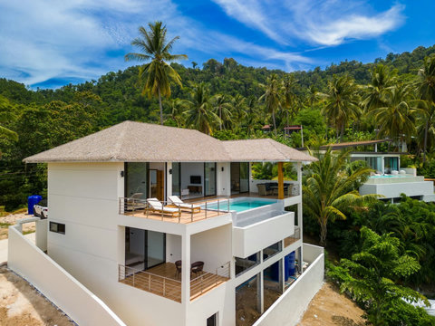 Stunning aerial view of Sunrise Hill luxury villa - 4-bedroom modern Koh Samui retreat with infinity pool and tropical setting
