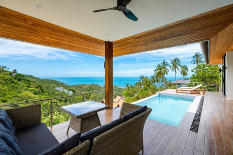 Covered sala terrace with ocean view, pool and outdoor lounging - spectacular luxury villa panorama