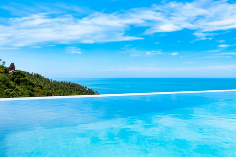 Infinity pool blending with turquoise sea horizon - Sunrise Hill Koh Samui luxury villa breathtaking ocean panorama