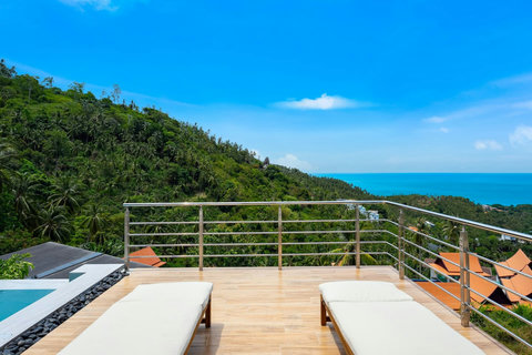 Rooftop sun deck with ocean and mountain panoramas - spectacular hillside views from every angle