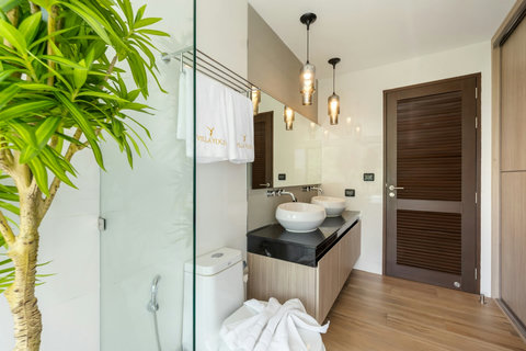 Modern bathroom with vessel sink and walk-in shower at Villa Yoco Koh Samui
