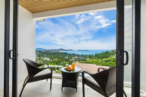Private terrace seating with panoramic sea and island views at Villa Yoco Koh Samui