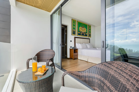 Bedroom with private balcony seating and morning refreshments at Villa Yoco, Koh Samui
