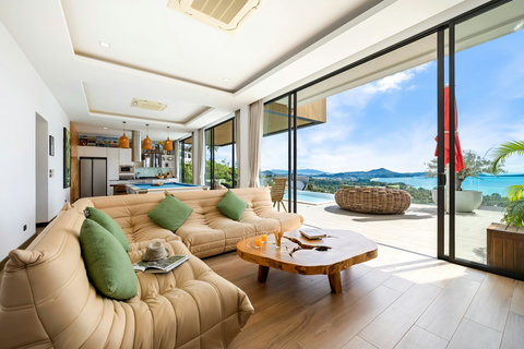 Open living room opening to sea-view terrace and pool at Villa Yoco Koh Samui