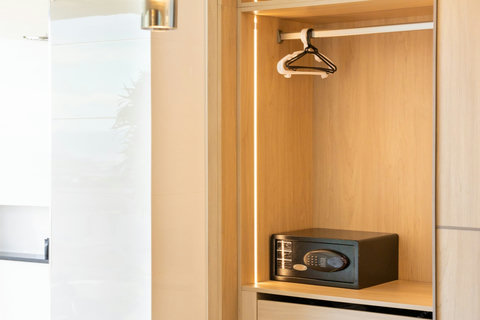 Wardrobe with in-room safe and hanging space at Villa Yoco, Koh Samui
