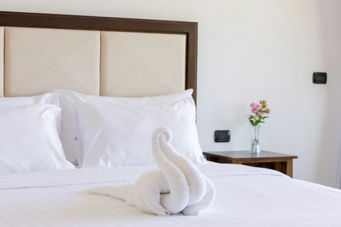 Comfortable king bedroom with elegant decor at Villa Yoco Koh Samui
