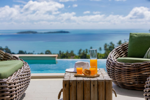 Poolside drinks with panoramic sea and island views at Villa Yoco Koh Samui