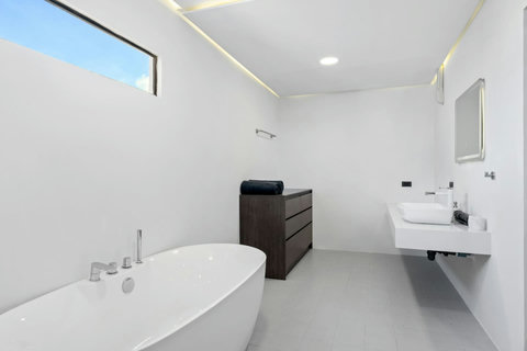Luxury bathroom with bathtub at C'est la Vie, Replay Residence Koh Samui
