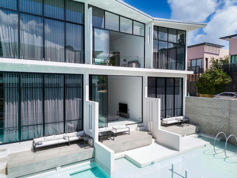 Private pool area with loungers at C'est la Vie villa, Replay Residence Koh Samui