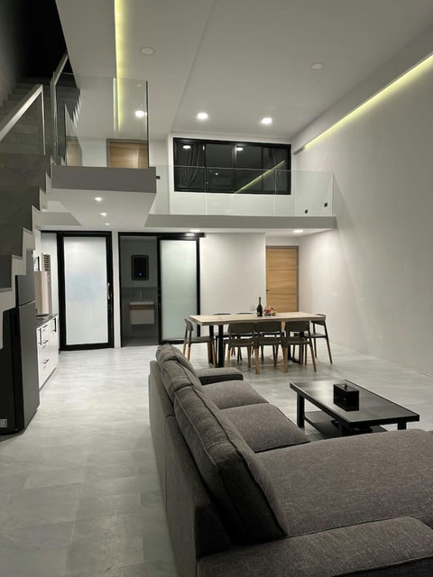 Dining area with designer lighting at C'est la Vie villa, Replay Residence Koh Samui