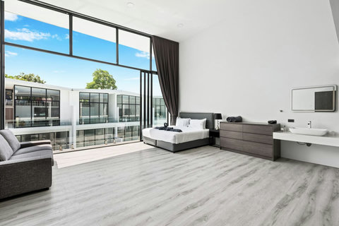 Living room with flat-screen TV at C'est la Vie, Replay Residence Koh Samui