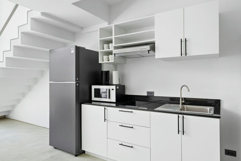 Fully equipped modern kitchen at C'est la Vie, Replay Residence Koh Samui