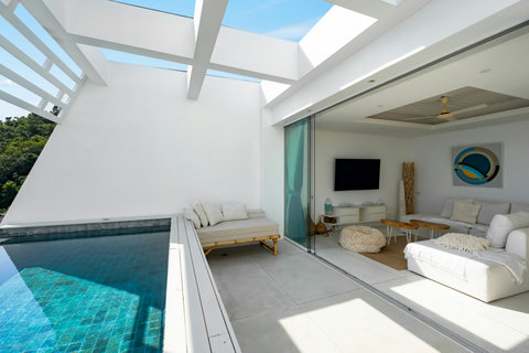 Modern kitchen and dining area with designer pendant lights and ocean views, Koh Samui villa rental