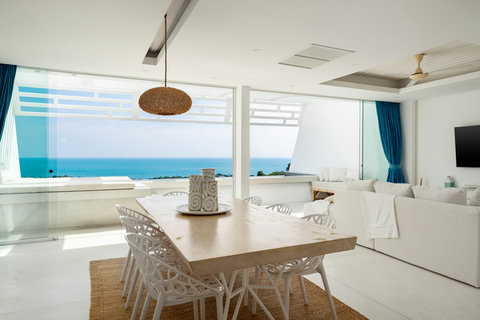 Stylish living area with sea views and tropical decor at oceanfront Koh Samui vacation rental