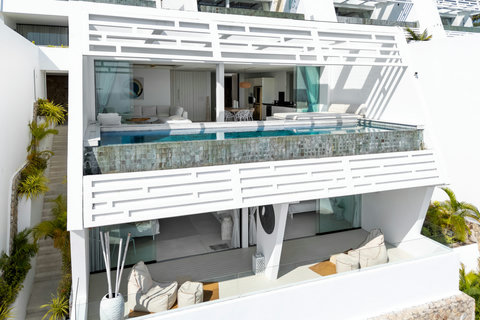 Multi-level villa exterior with private outdoor bathtub and ocean-facing balconies, Villa Ocean Serenity