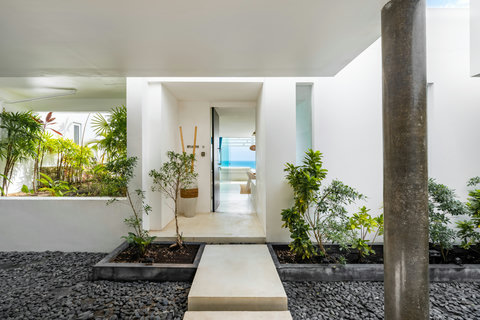 Stylish villa entrance with tropical landscaping and modern architecture at Villa Ocean Serenity Koh Samui
