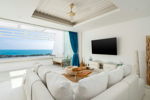 Serene bedroom with private balcony and Gulf of Thailand views at Villa Ocean Serenity