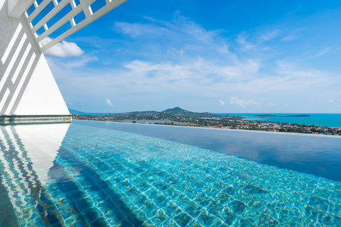 Infinity pool with stunning ocean views and tropical island backdrop at Villa Ocean Serenity Koh Samui