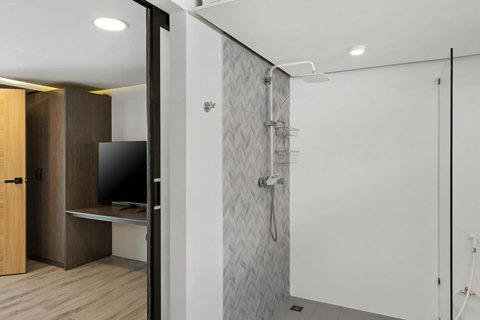 Luxurious bathroom with freestanding bathtub perfect for relaxing after a day at the beach