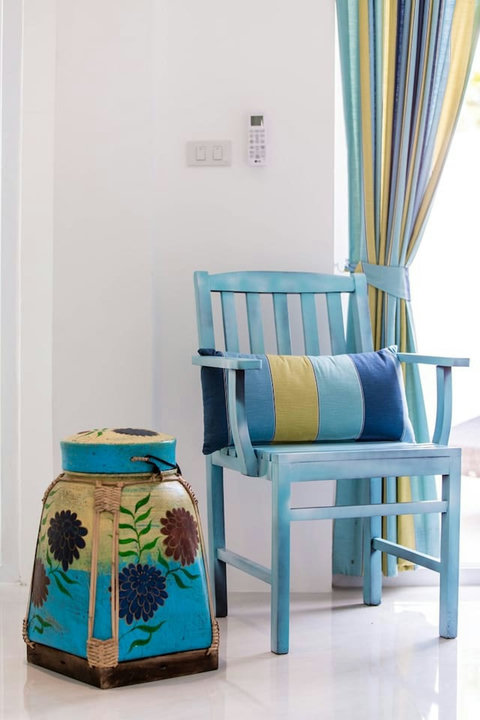 Bright guest bedroom with tropical beach decor Thongsong Bay villa