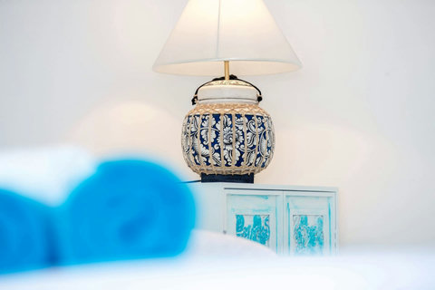 Elegant Thai decor accents with coastal blue tones luxury villa Samui