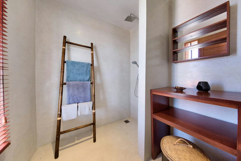 Modern bathroom with natural wood details Thongsong Bay villa Samui