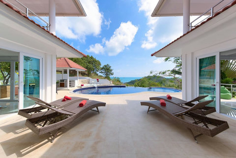 Open-air living room with infinity pool and ocean views Koh Samui