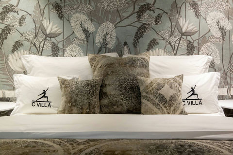 Signature C Villa botanical designer pillows at luxury 8BR Plai Laem vacation rental