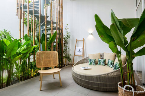 Outdoor terrace with hanging rattan chairs and tropical views at C Villa, Plai Laem Koh Samui
