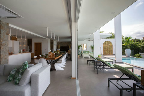 Spacious open-plan dining area with marble floors at C Villa 8-bedroom Plai Laem retreat
