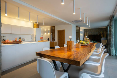Fully equipped modern kitchen with dining counter at C Villa 8BR retreat, Koh Samui