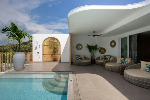 Artistic Moroccan-style entrance with arched doorway at C Villa art villa in Koh Samui, Thailand