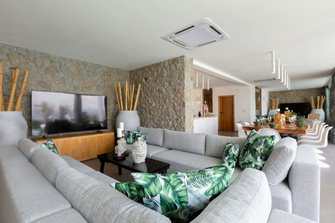 Modern living room with contemporary decor at C Villa 8-bedroom vacation home, Koh Samui Thailand