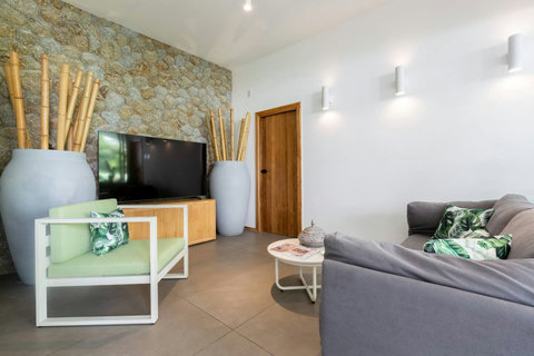 Spacious master bedroom with modern amenities at C Villa luxury Plai Laem vacation home