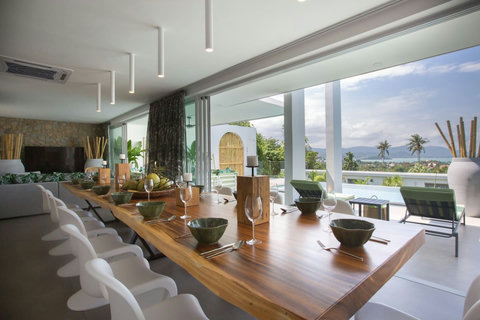 Open-air tropical living room with wooden beams at C Villa luxury rental in Plai Laem, Koh Samui