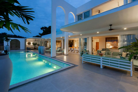 Elevated terrace with tropical garden views at C Villa 8-bedroom Plai Laem retreat, Thailand