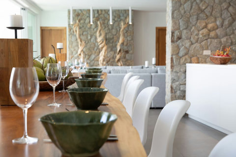 Elegant tropical dining setup with fresh greenery at C Villa luxury retreat, Koh Samui
