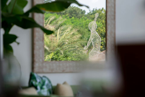 Natural tropical decor and welcome display at C Villa art villa in Koh Samui, Thailand